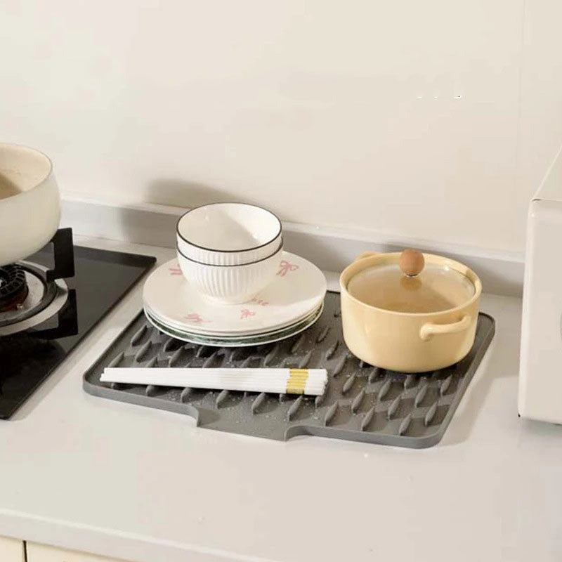 🍴Une aide précieuse dans la cuisine💧Tapis d'évacuation en silicone multifonctionnel et pliable(🚀50% Rabatt)