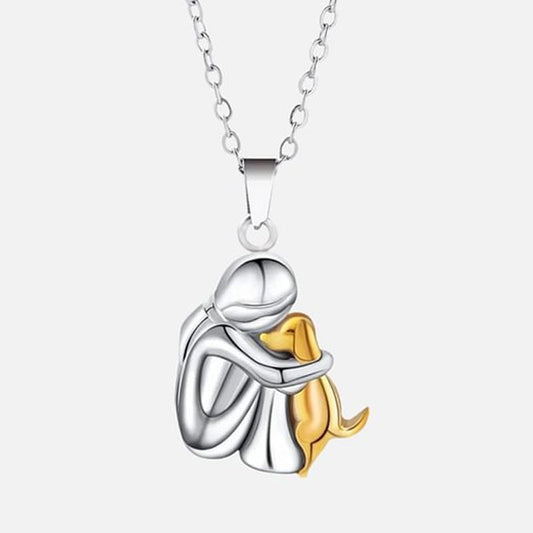 Petite Fille Câlinant un Chien – Clous d’Oreilles et Collier