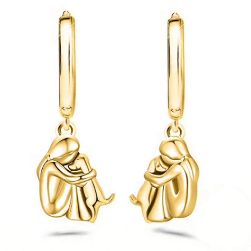 Petite Fille Câlinant un Chien – Clous d’Oreilles et Collier