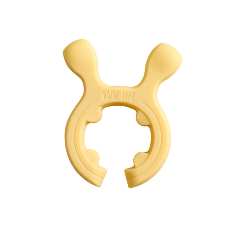 Support multifonction en silicone pour poignées de casseroles et spatules