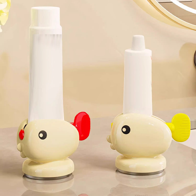 Adorable poisson rouge avec ventouse pour presser le dentifrice