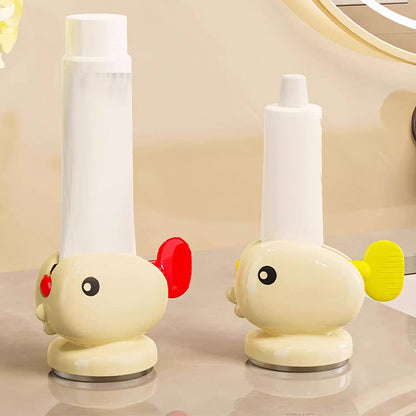 Adorable poisson rouge avec ventouse pour presser le dentifrice